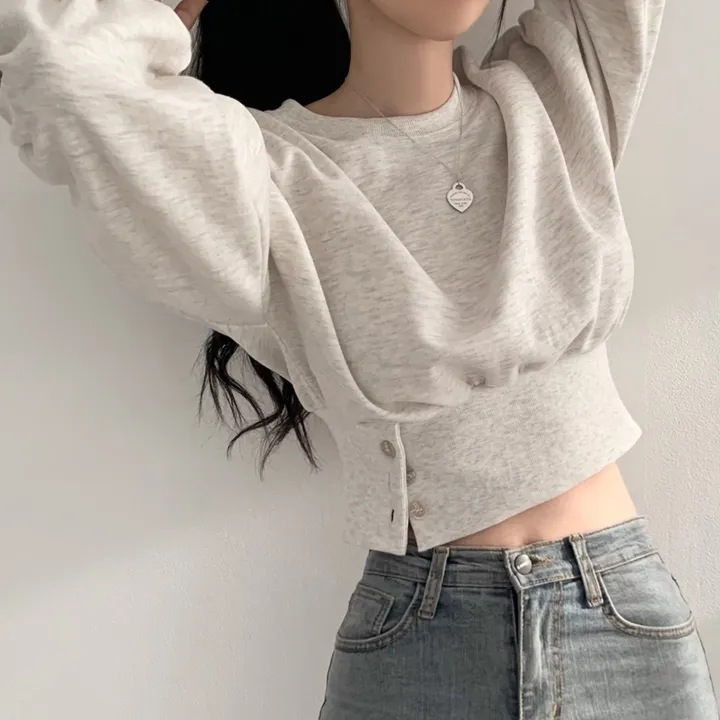 ウエストボタンプルオーバートレーナー