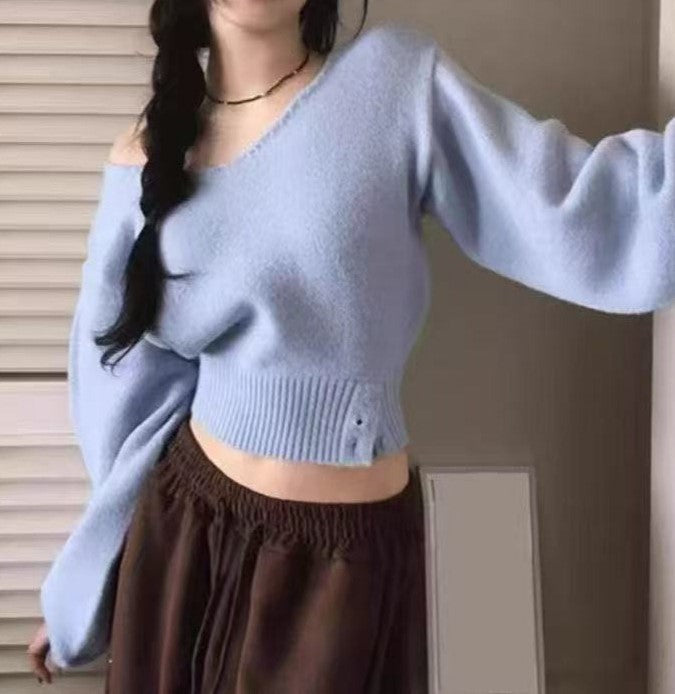 ウエストシェイプセーター